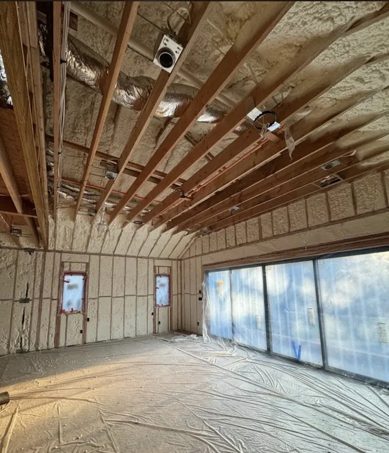 Interior walls and ceiling insulated with spray foam during new construction in Fruitville